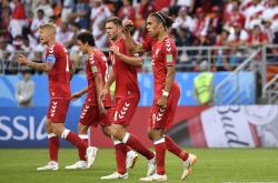 lol合区-塞尔维亚足球队在比赛中表现抢眼，晋级